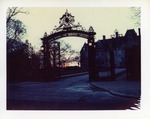 View of the gate of Ochre Court from across the street in Winter by Joseph Souza