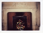 Fire place with flowers by Joseph Souza